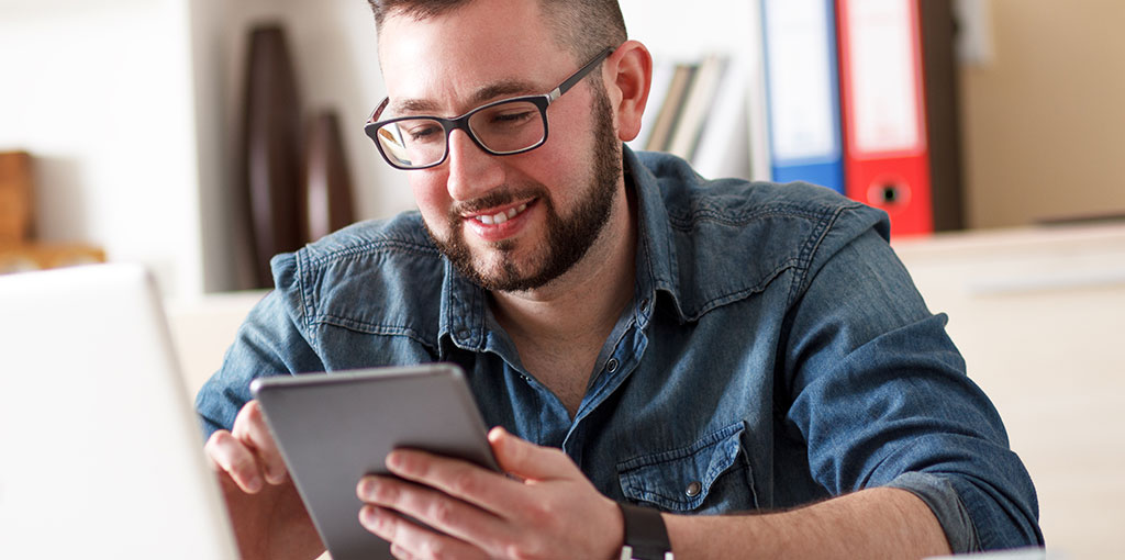 Man with device featured image